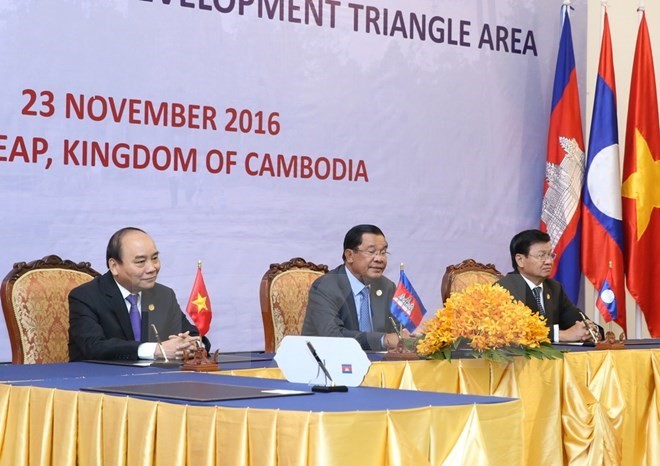 Vietnam, Laos, Cambodia determined to uphold special cooperation mechanism - ảnh 1